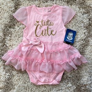Adorable pink Gerber Baby bodysuit with tutu skirt.
